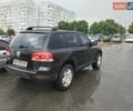Черный Фольксваген Туарег, объемом двигателя 3.2 л и пробегом 227 тыс. км за 6500 $, фото 1 на Automoto.ua