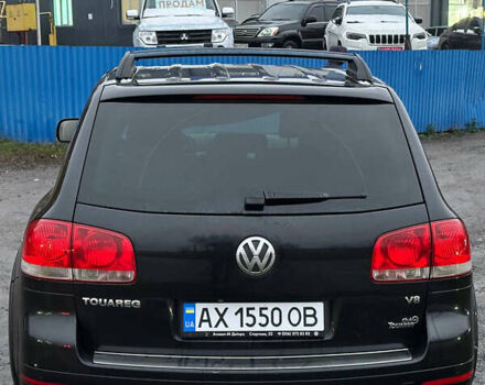 Черный Фольксваген Туарег, объемом двигателя 4.17 л и пробегом 343 тыс. км за 5500 $, фото 3 на Automoto.ua