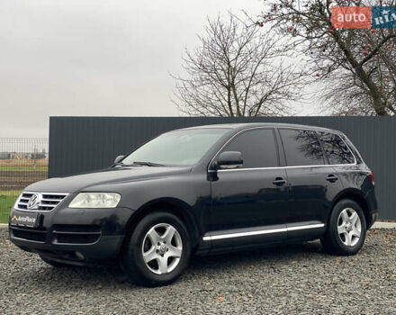 Черный Фольксваген Туарег, объемом двигателя 2.5 л и пробегом 373 тыс. км за 6950 $, фото 78 на Automoto.ua