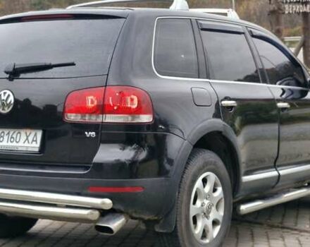 Черный Фольксваген Туарег, объемом двигателя 3.2 л и пробегом 237 тыс. км за 7500 $, фото 1 на Automoto.ua