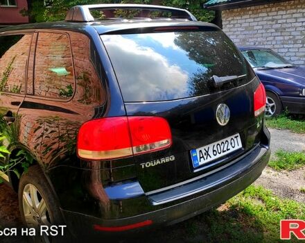 Черный Фольксваген Туарег, объемом двигателя 3.2 л и пробегом 430 тыс. км за 9500 $, фото 2 на Automoto.ua