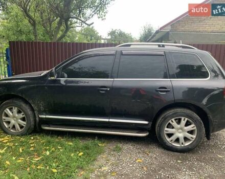 Черный Фольксваген Туарег, объемом двигателя 4.92 л и пробегом 354 тыс. км за 7000 $, фото 1 на Automoto.ua