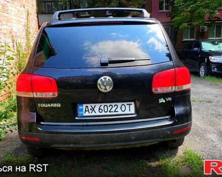 Черный Фольксваген Туарег, объемом двигателя 3.2 л и пробегом 430 тыс. км за 9500 $, фото 1 на Automoto.ua
