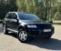 Черный Фольксваген Туарег, объемом двигателя 3.2 л и пробегом 94 тыс. км за 9999 $, фото 1 на Automoto.ua