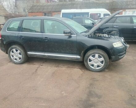 Черный Фольксваген Туарег, объемом двигателя 5 л и пробегом 313 тыс. км за 3500 $, фото 4 на Automoto.ua