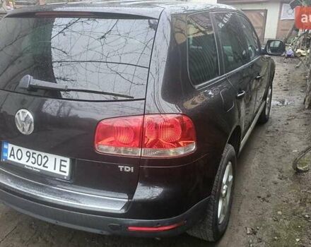 Чорний Фольксваген Туарег, об'ємом двигуна 2.46 л та пробігом 390 тис. км за 8500 $, фото 4 на Automoto.ua