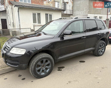 Черный Фольксваген Туарег, объемом двигателя 2.51 л и пробегом 321 тыс. км за 5999 $, фото 1 на Automoto.ua