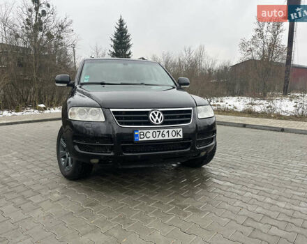 Черный Фольксваген Туарег, объемом двигателя 2.46 л и пробегом 221 тыс. км за 6700 $, фото 1 на Automoto.ua