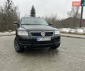 Черный Фольксваген Туарег, объемом двигателя 2.46 л и пробегом 221 тыс. км за 6700 $, фото 1 на Automoto.ua