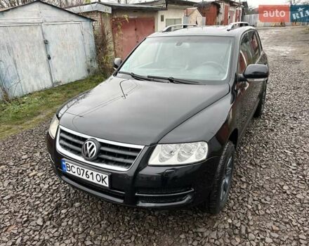 Черный Фольксваген Туарег, объемом двигателя 2.46 л и пробегом 225 тыс. км за 6450 $, фото 1 на Automoto.ua