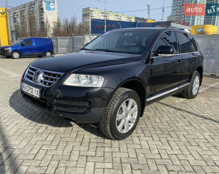 Чорний Фольксваген Туарег, об'ємом двигуна 3.2 л та пробігом 256 тис. км за 9200 $, фото 1 на Automoto.ua