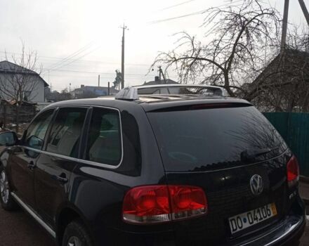 Черный Фольксваген Туарег, объемом двигателя 5 л и пробегом 290 тыс. км за 5000 $, фото 4 на Automoto.ua