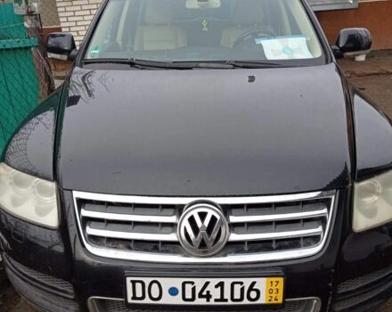 Черный Фольксваген Туарег, объемом двигателя 5 л и пробегом 290 тыс. км за 5000 $, фото 3 на Automoto.ua