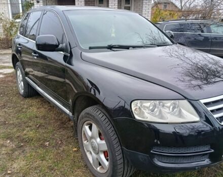 Черный Фольксваген Туарег, объемом двигателя 3.2 л и пробегом 320 тыс. км за 7800 $, фото 1 на Automoto.ua