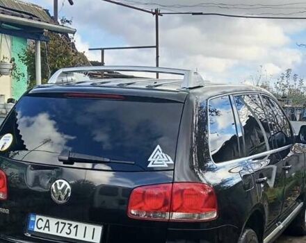 Черный Фольксваген Туарег, объемом двигателя 5 л и пробегом 315 тыс. км за 8500 $, фото 2 на Automoto.ua