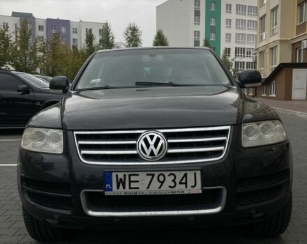 Черный Фольксваген Туарег, объемом двигателя 5 л и пробегом 225 тыс. км за 4099 $, фото 1 на Automoto.ua