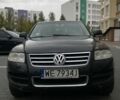 Черный Фольксваген Туарег, объемом двигателя 5 л и пробегом 225 тыс. км за 4099 $, фото 1 на Automoto.ua