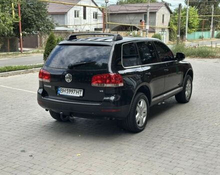 Черный Фольксваген Туарег, объемом двигателя 3.2 л и пробегом 280 тыс. км за 7599 $, фото 2 на Automoto.ua