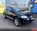 Черный Фольксваген Туарег, объемом двигателя 4.2 л и пробегом 250 тыс. км за 4700 $, фото 1 на Automoto.ua