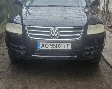 Чорний Фольксваген Туарег, об'ємом двигуна 2.46 л та пробігом 390 тис. км за 8500 $, фото 1 на Automoto.ua