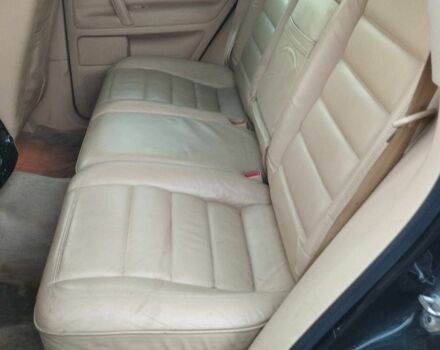 Черный Фольксваген Туарег, объемом двигателя 5 л и пробегом 290 тыс. км за 5000 $, фото 1 на Automoto.ua