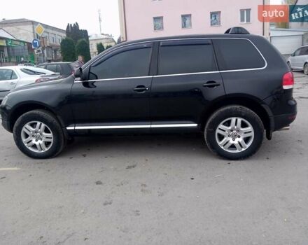 Черный Фольксваген Туарег, объемом двигателя 3.19 л и пробегом 236 тыс. км за 10000 $, фото 2 на Automoto.ua