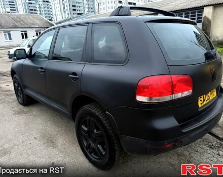 Чорний Фольксваген Туарег, об'ємом двигуна 3 л та пробігом 277 тис. км за 4300 $, фото 1 на Automoto.ua