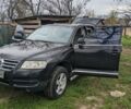 Чорний Фольксваген Туарег, об'ємом двигуна 2.46 л та пробігом 430 тис. км за 8200 $, фото 1 на Automoto.ua