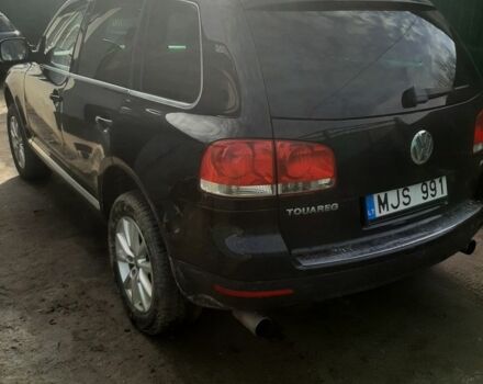 Черный Фольксваген Туарег, объемом двигателя 3 л и пробегом 300 тыс. км за 6500 $, фото 1 на Automoto.ua