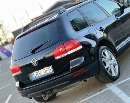 Черный Фольксваген Туарег, объемом двигателя 3 л и пробегом 300 тыс. км за 6500 $, фото 19 на Automoto.ua