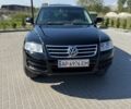 Черный Фольксваген Туарег, объемом двигателя 3 л и пробегом 270 тыс. км за 9990 $, фото 1 на Automoto.ua