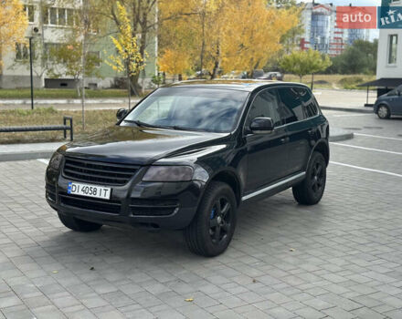 Черный Фольксваген Туарег, объемом двигателя 2.97 л и пробегом 325 тыс. км за 8850 $, фото 1 на Automoto.ua