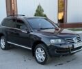 Черный Фольксваген Туарег, объемом двигателя 4.2 л и пробегом 200 тыс. км за 7200 $, фото 1 на Automoto.ua