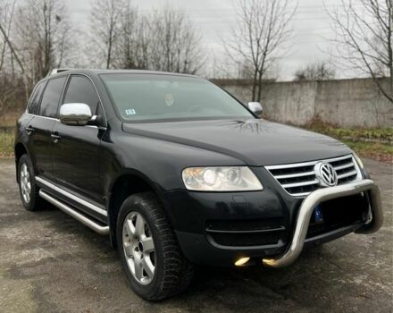 Чорний Фольксваген Туарег, об'ємом двигуна 3 л та пробігом 325 тис. км за 5999 $, фото 3 на Automoto.ua