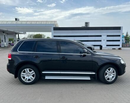 Черный Фольксваген Туарег, объемом двигателя 4.2 л и пробегом 318 тыс. км за 6500 $, фото 4 на Automoto.ua