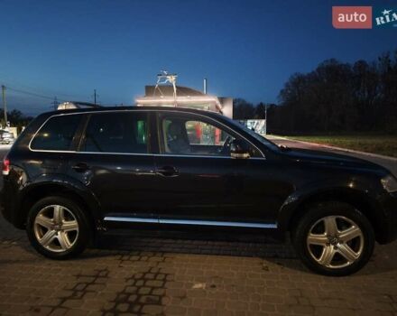Чорний Фольксваген Туарег, об'ємом двигуна 3 л та пробігом 311 тис. км за 8600 $, фото 4 на Automoto.ua