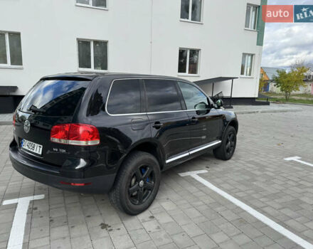 Черный Фольксваген Туарег, объемом двигателя 2.97 л и пробегом 325 тыс. км за 8850 $, фото 12 на Automoto.ua