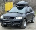 Чорний Фольксваген Туарег, об'ємом двигуна 3 л та пробігом 496 тис. км за 3999 $, фото 1 на Automoto.ua