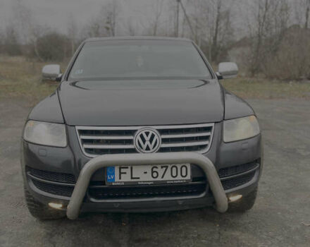 Черный Фольксваген Туарег, объемом двигателя 3 л и пробегом 325 тыс. км за 5900 $, фото 3 на Automoto.ua