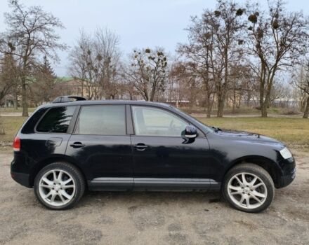 Черный Фольксваген Туарег, объемом двигателя 3 л и пробегом 300 тыс. км за 6500 $, фото 4 на Automoto.ua