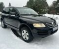 Черный Фольксваген Туарег, объемом двигателя 3 л и пробегом 295 тыс. км за 3636 $, фото 1 на Automoto.ua