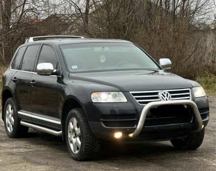 Чорний Фольксваген Туарег, об'ємом двигуна 3 л та пробігом 325 тис. км за 5999 $, фото 1 на Automoto.ua