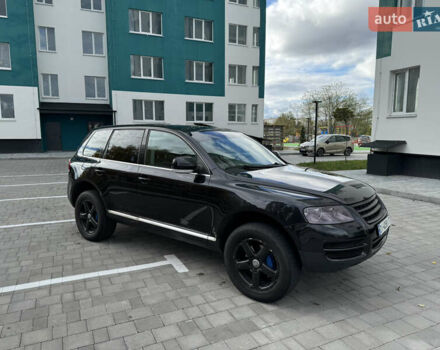 Черный Фольксваген Туарег, объемом двигателя 2.97 л и пробегом 325 тыс. км за 8850 $, фото 11 на Automoto.ua