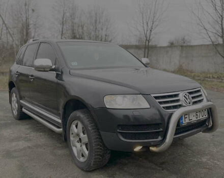 Черный Фольксваген Туарег, объемом двигателя 3 л и пробегом 325 тыс. км за 5900 $, фото 4 на Automoto.ua