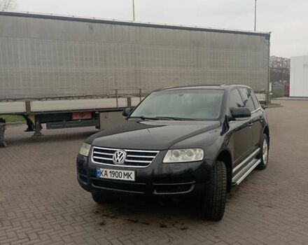 Черный Фольксваген Туарег, объемом двигателя 4.17 л и пробегом 316 тыс. км за 7500 $, фото 1 на Automoto.ua