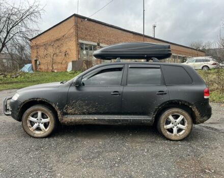 Чорний Фольксваген Туарег, об'ємом двигуна 3 л та пробігом 496 тис. км за 4250 $, фото 2 на Automoto.ua