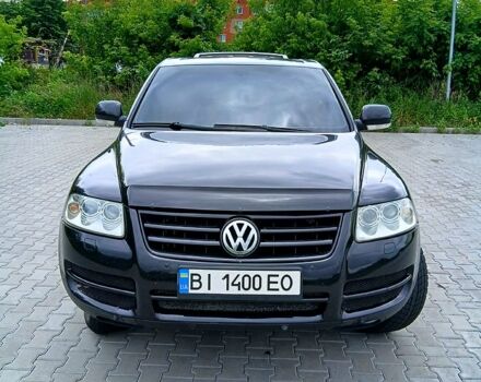 Черный Фольксваген Туарег, объемом двигателя 3.2 л и пробегом 303 тыс. км за 8950 $, фото 1 на Automoto.ua