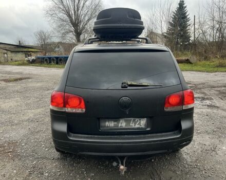 Чорний Фольксваген Туарег, об'ємом двигуна 3 л та пробігом 496 тис. км за 4250 $, фото 4 на Automoto.ua