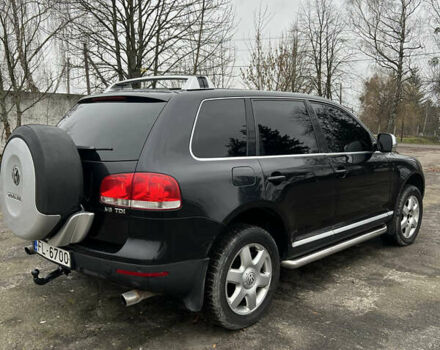 Черный Фольксваген Туарег, объемом двигателя 3 л и пробегом 325 тыс. км за 5900 $, фото 5 на Automoto.ua