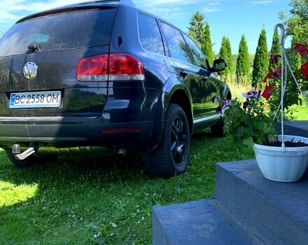 Черный Фольксваген Туарег, объемом двигателя 3 л и пробегом 200 тыс. км за 13000 $, фото 2 на Automoto.ua